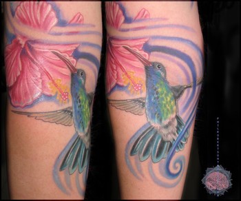 Looking for unique  Tattoos? Hibiscus flower and hummingbird tattoo